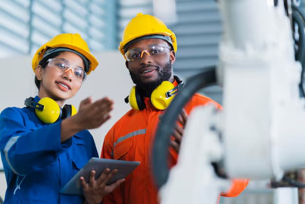 Deux ingénieurs CONFEDEX sur une ligne de production industrielle